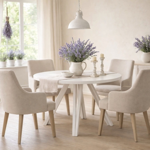 Brenna - biały okrągły rozkładany stół na bukowych nogach aranżacja
